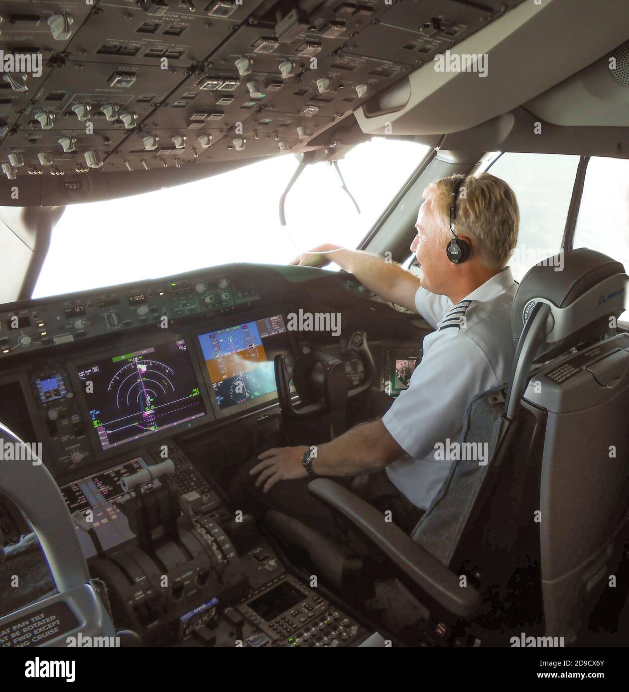 Co-pilot in a Boeing 767 Dreamliner flight deck Stock Photo
