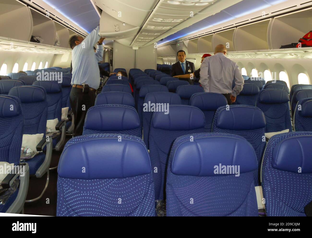Passengers boarding airliner Stock Photo