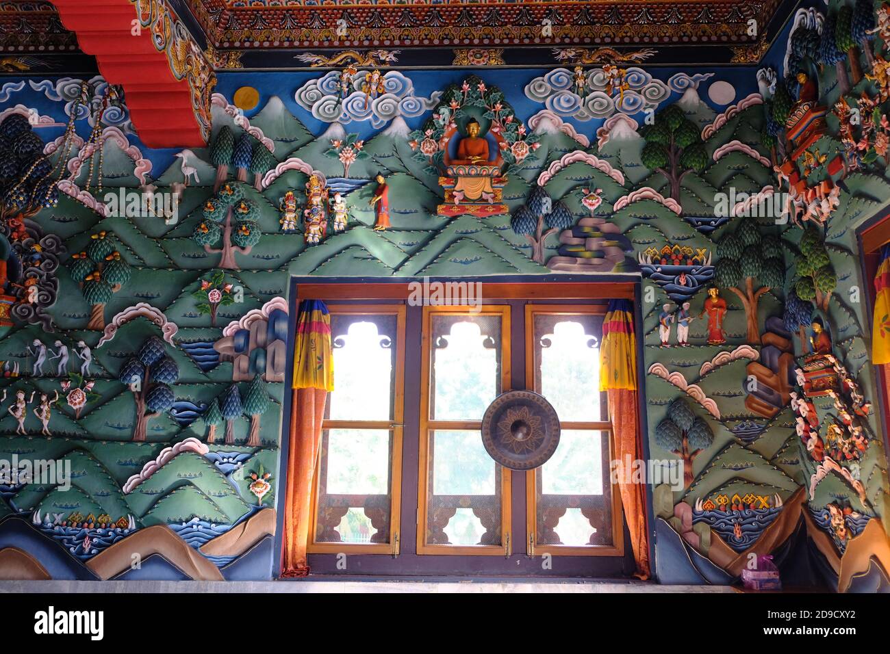 India Bodh Gaya - Royal Bhutan Monastery interior with buddhist religious wall paintings Stock Photo