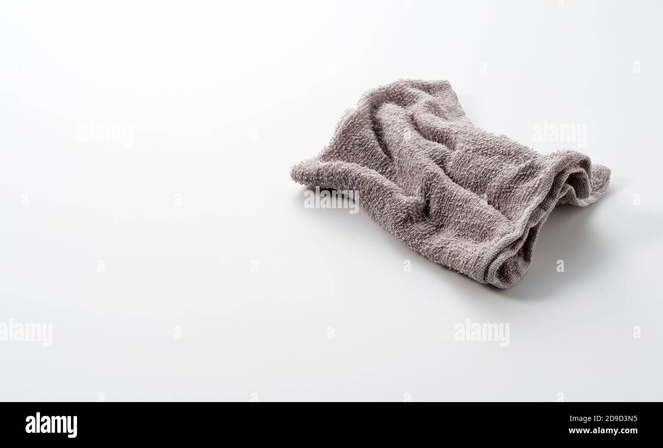A grey rag placed on a white background with space Stock Photo
