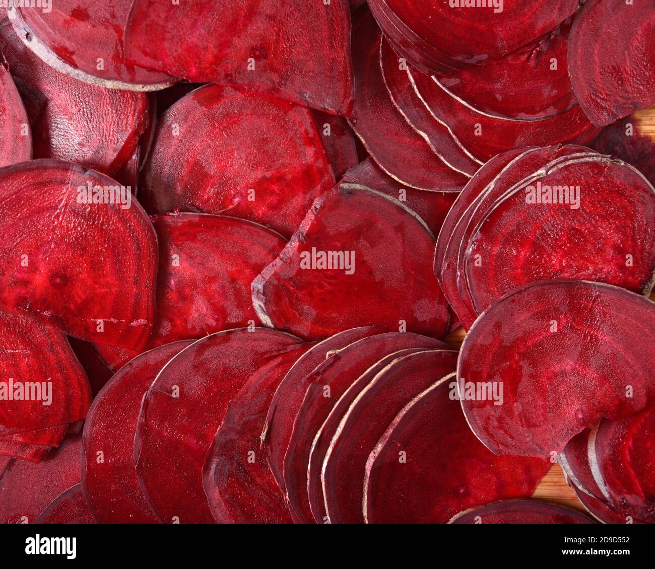Background of thin sliced juicy red beets Stock Photo