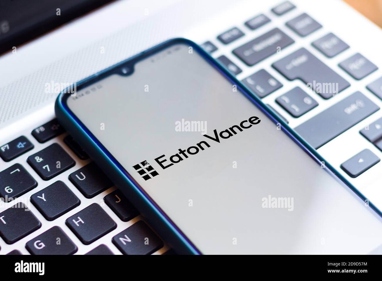 In this photo illustration the Eaton Vance Corporation logo seen displayed on a smartphone. Stock Photo