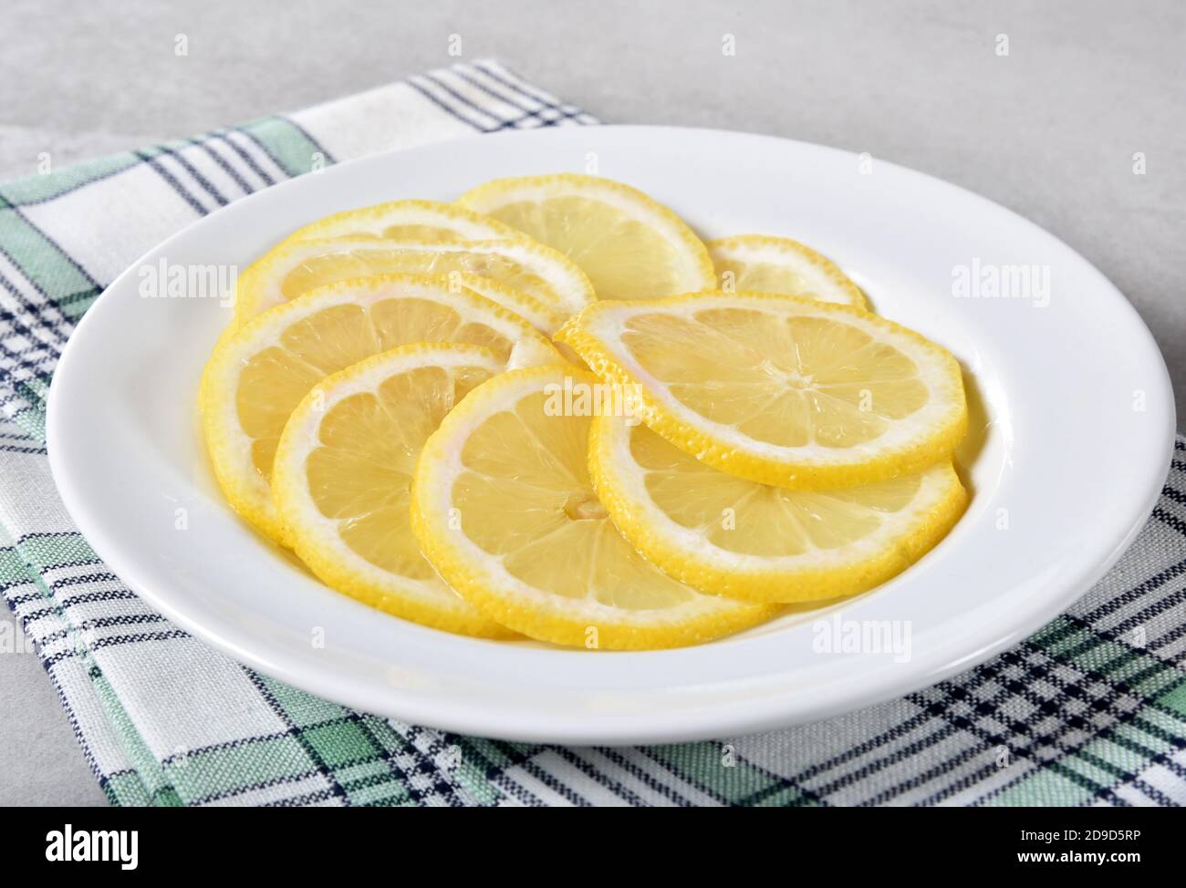 A plate of thin sliced lemon Stock Photo