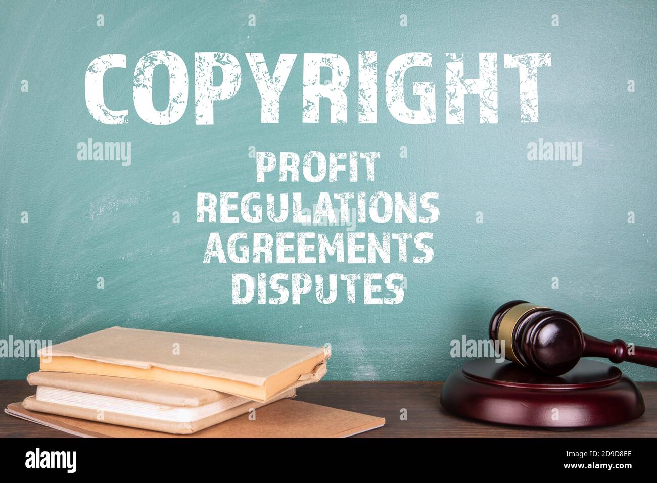 COPYRIGHT. Profit, Regulations, Contracts and Disputes concept. Judge's hammer on a wooden table Stock Photo