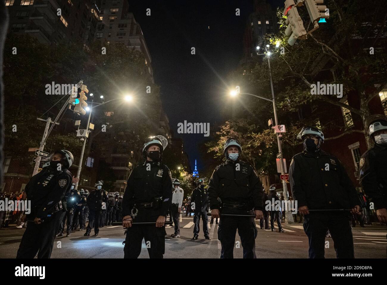 New York, New York, US. Nov 4th 2020. As the US awaits election results, New York City police stand by at Washington Square Park following an anti-Trump march through Greenwich Village Stock Photo