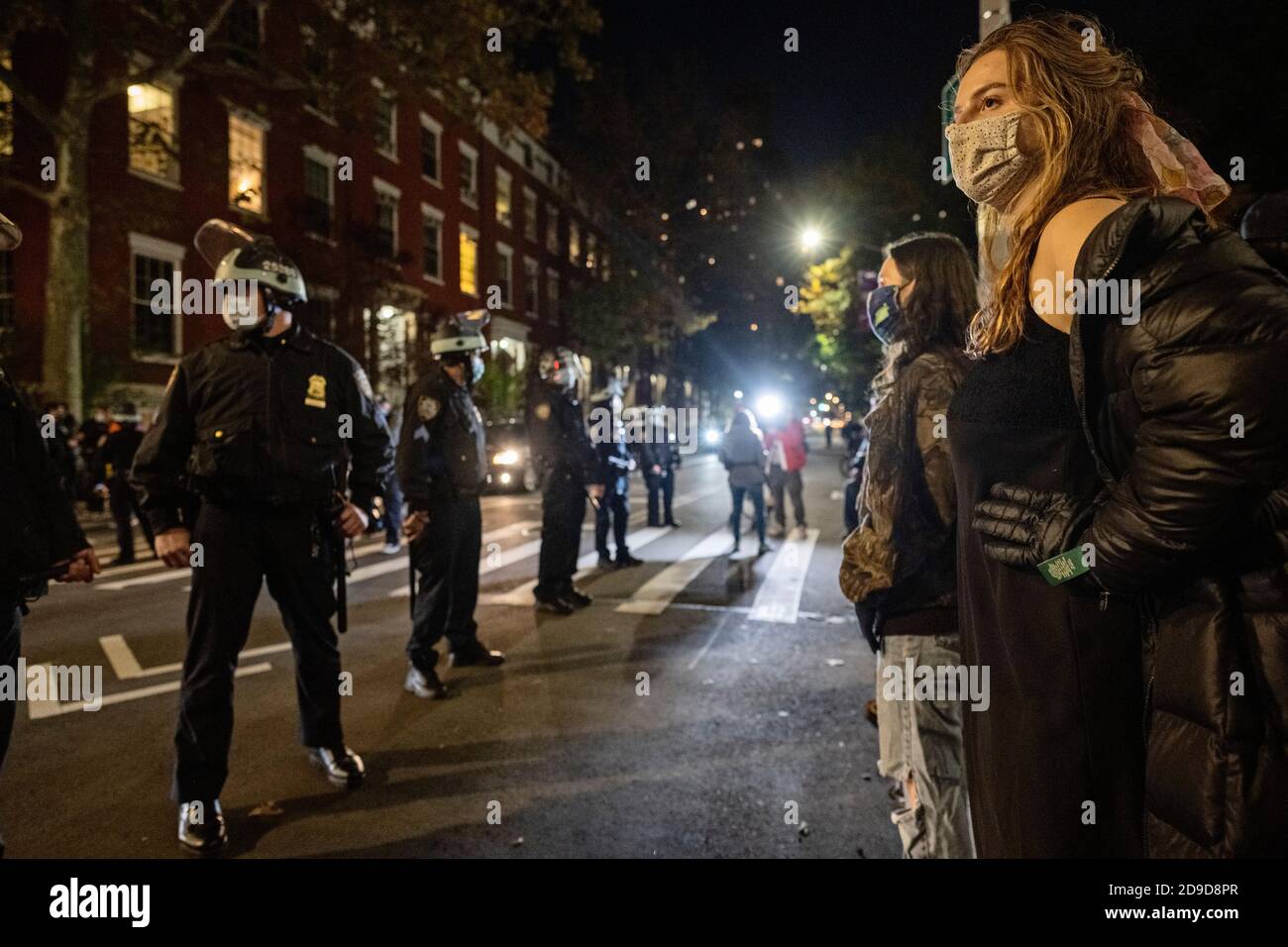 New York, New York, US. Nov 4th 2020. Protesters and police face each other at Washington Square Park following an anti-Trump march as the US awaits election results Stock Photo