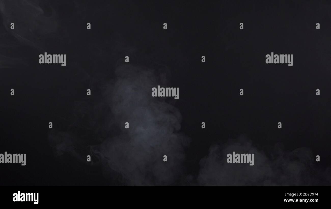 Shooting of cloudy cigarette smoke texture on black background Stock ...