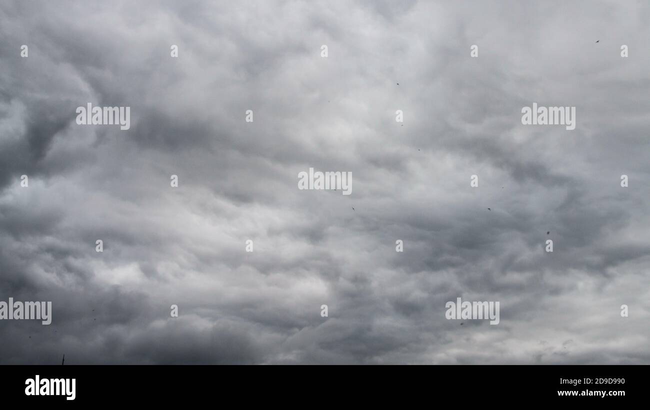 Image of rainy clouds on blue sky Stock Photo