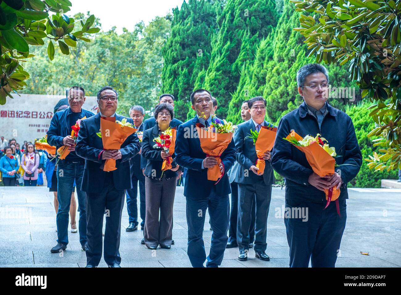 People attend the public memorial ceremony for Lu Xun, a Chinese writer, essayist, poet, and literary critic in Shanghai, China, 19 October 2020. Stock Photo