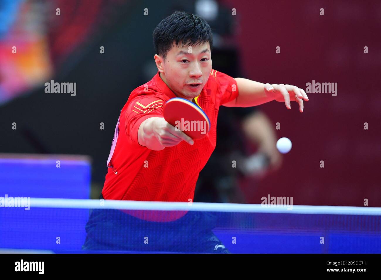 Chinese table tennis player Ma Long competes against Chinese table