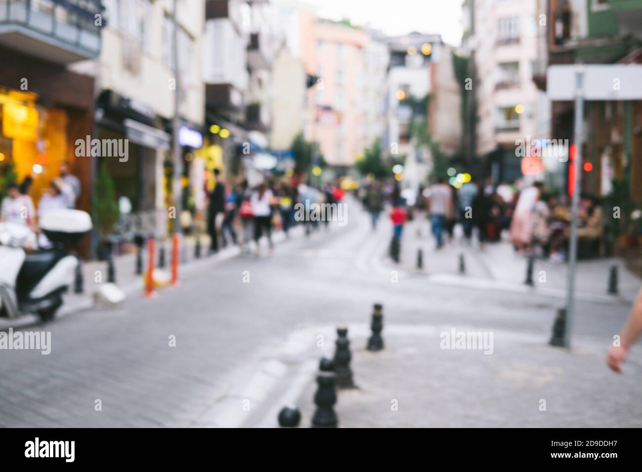 Bright defocused blurred background with unrecognizable people on the sity  street. Abstract image of crowd of people in public place Stock Photo -  Alamy
