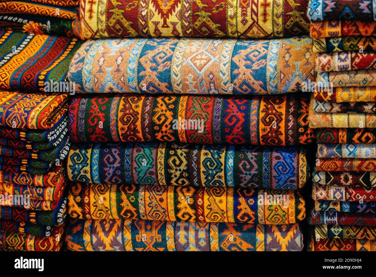 Traditional Turkish rug textile with patterns in bazaar Stock Photo Alamy