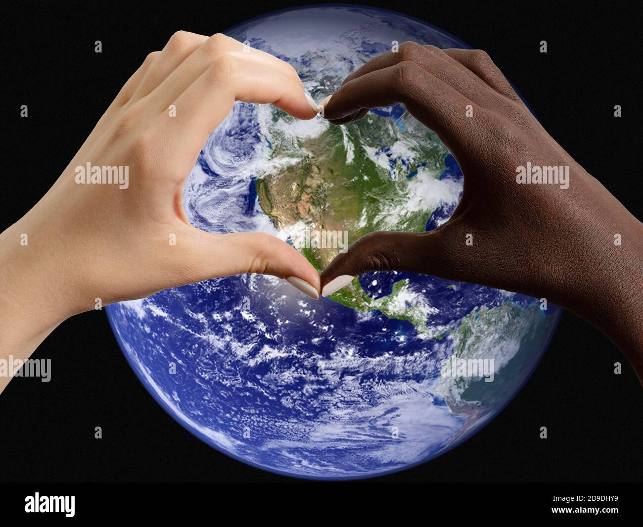 Hands hold Earth ball in heart shape on Doctor hands for World