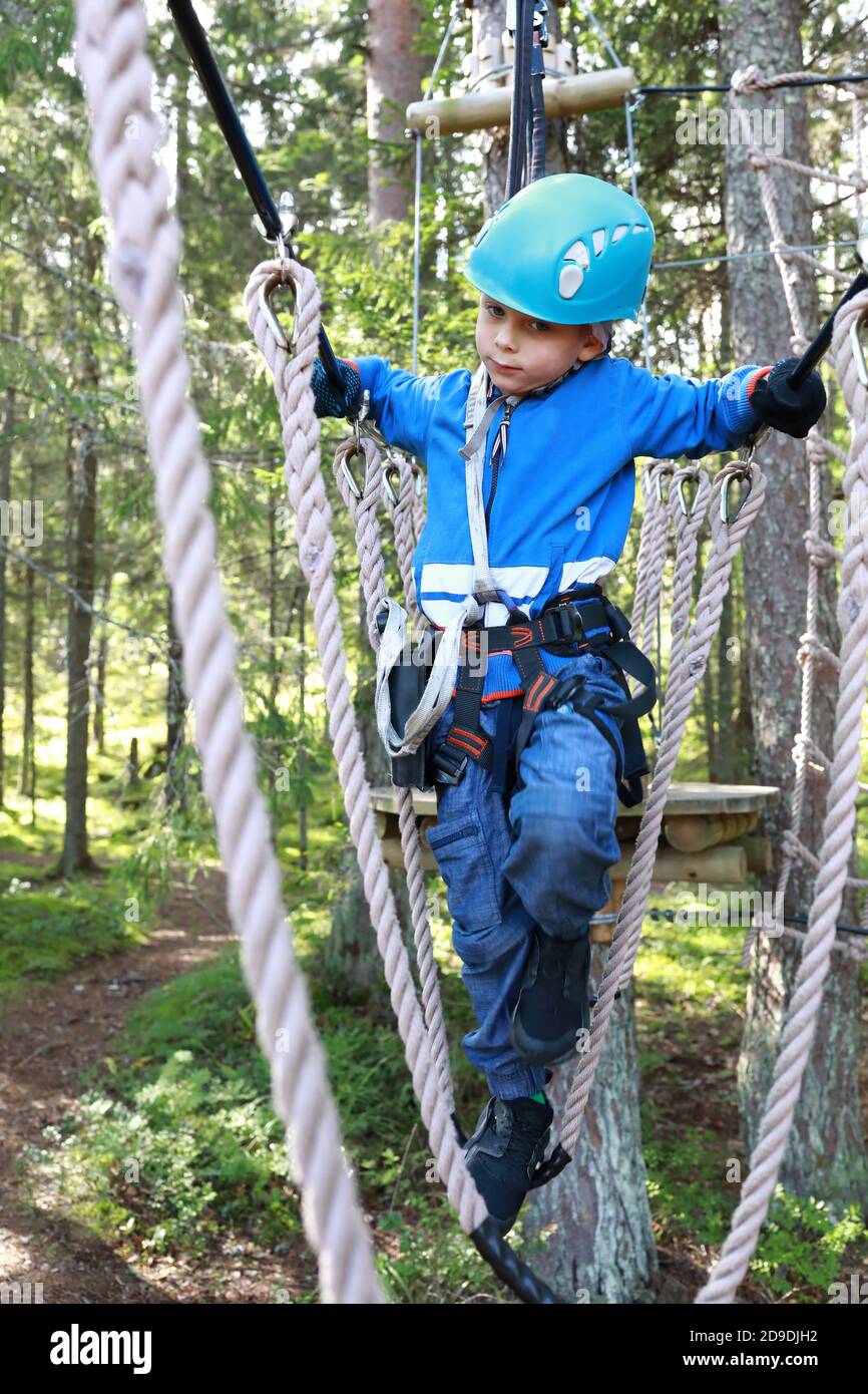 Ranging Ropes Kid overcoming hanging ropes hi-res stock photography and images - Alamy