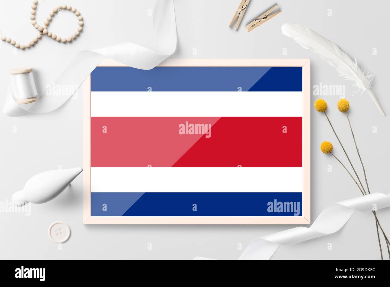 Costa Rica flag in wooden frame on white creative background. White ...