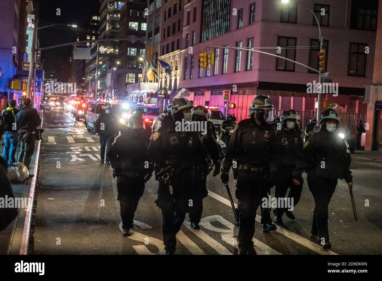 NEW YORK, NY - NOVEMBER 4, 2020: NYPD Police officers follow the ...