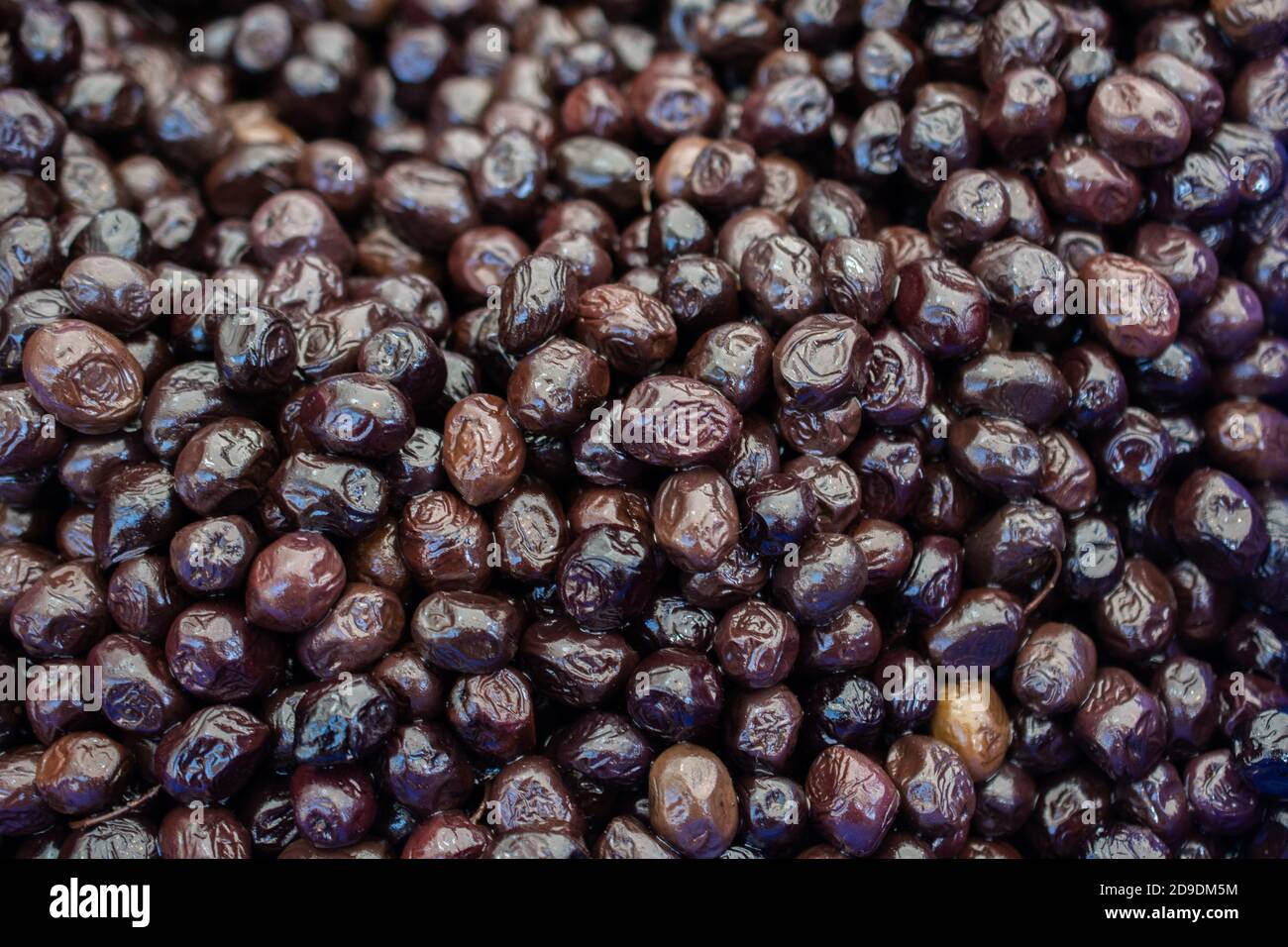 Black Olives As Health Food Preserved In Olive Oil Stock Photo - Alamy