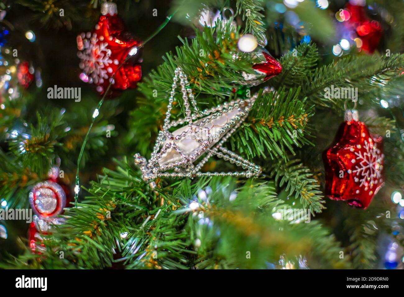 Christmas background with decorative star, fir branches and pine cones ...