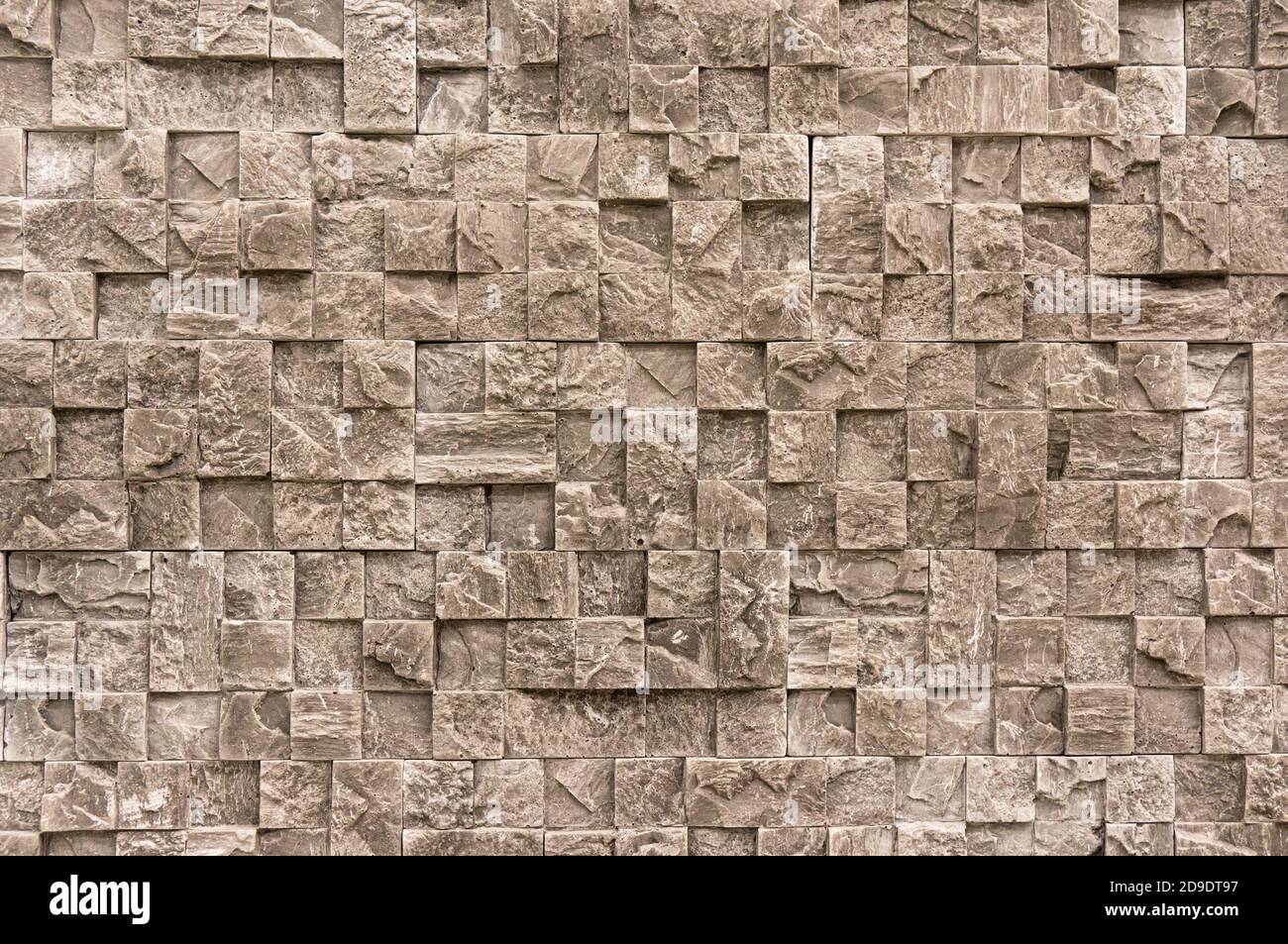 White cream marble stone limestone brick tile wall surface aged texture detailed pattern background Stock Photo