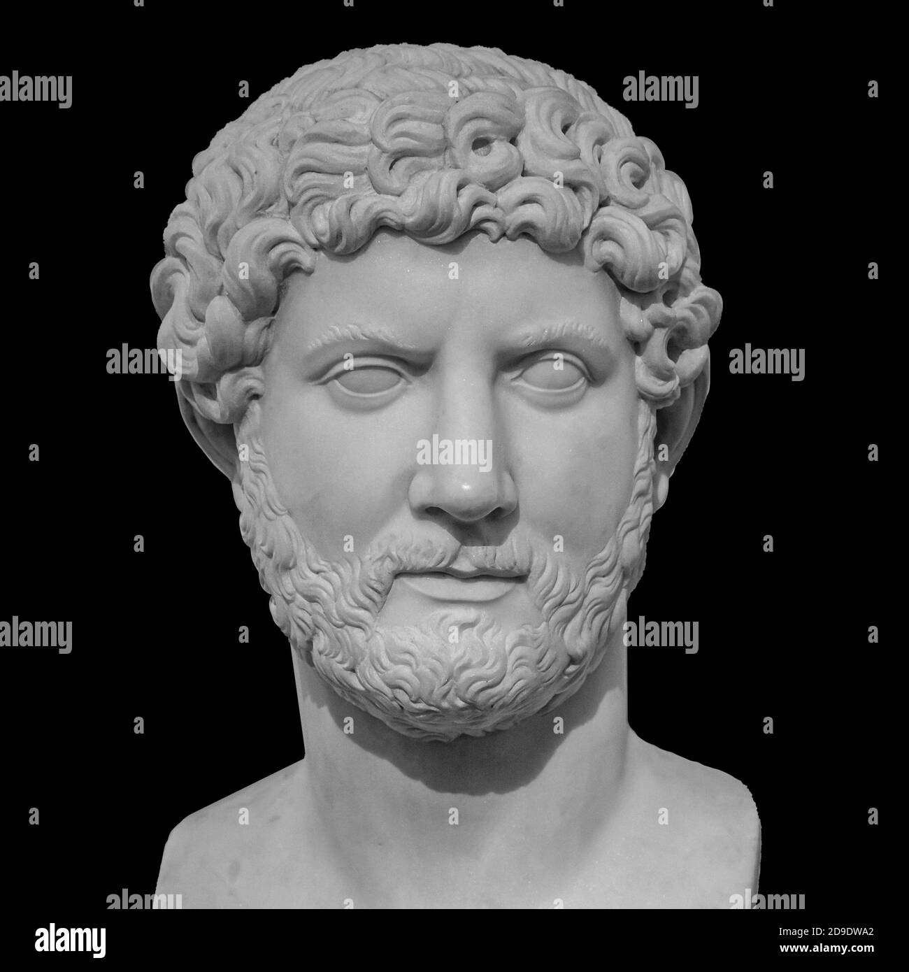 Head and shoulders detail of the ancient man with beard sculpture