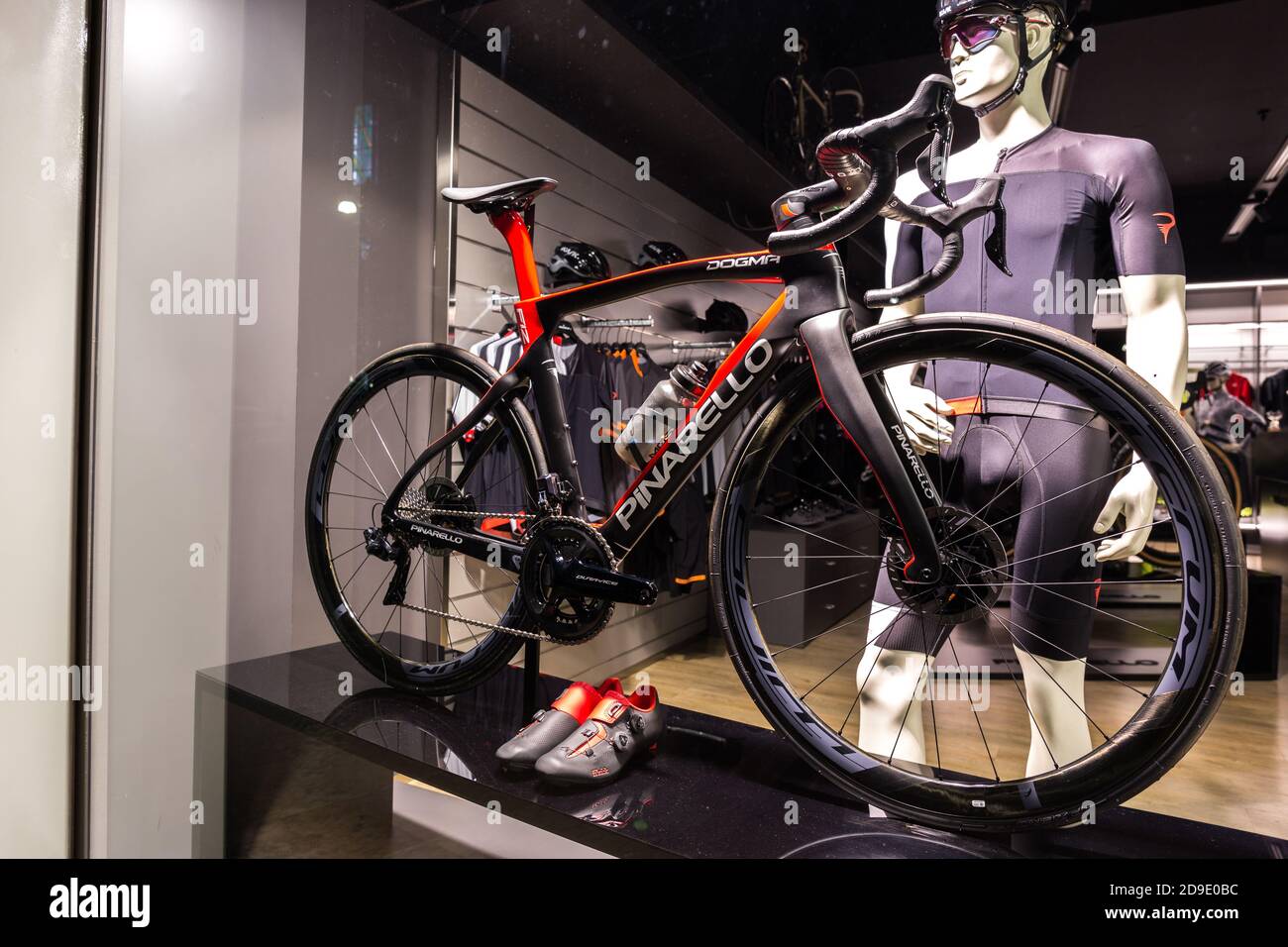 Black professional Pinarello Dogma Road Bike on display in official Pinarello bikes shop in Treviso Italy Stock Photo