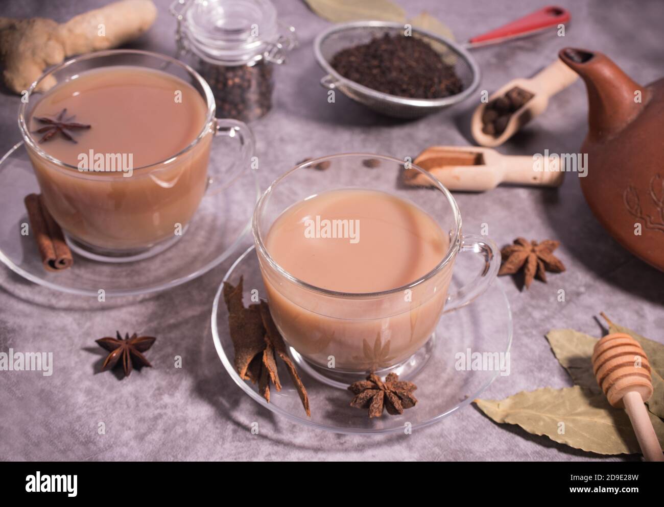Two cups of Indian tea masala tea. Tea with milk and spices. Horizontal orientation Stock Photo
