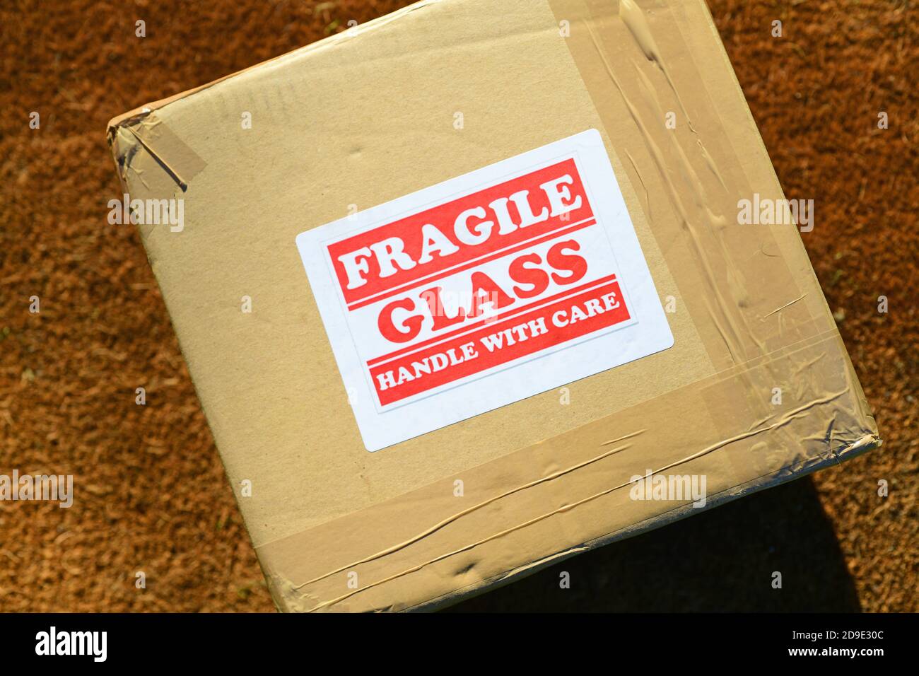 fragile glass warning label on parcel Stock Photo