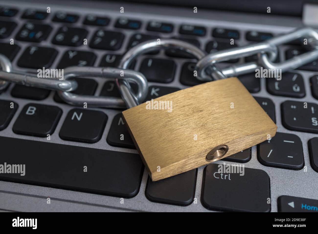 Lock with chain on computer keyboard. Data protection, privacy and ...