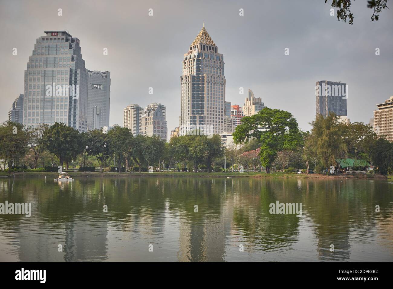 Bangkok, Thailand, March 2106. View of skyscrapers of the city from the lake of Lumpini Park. Stock Photo