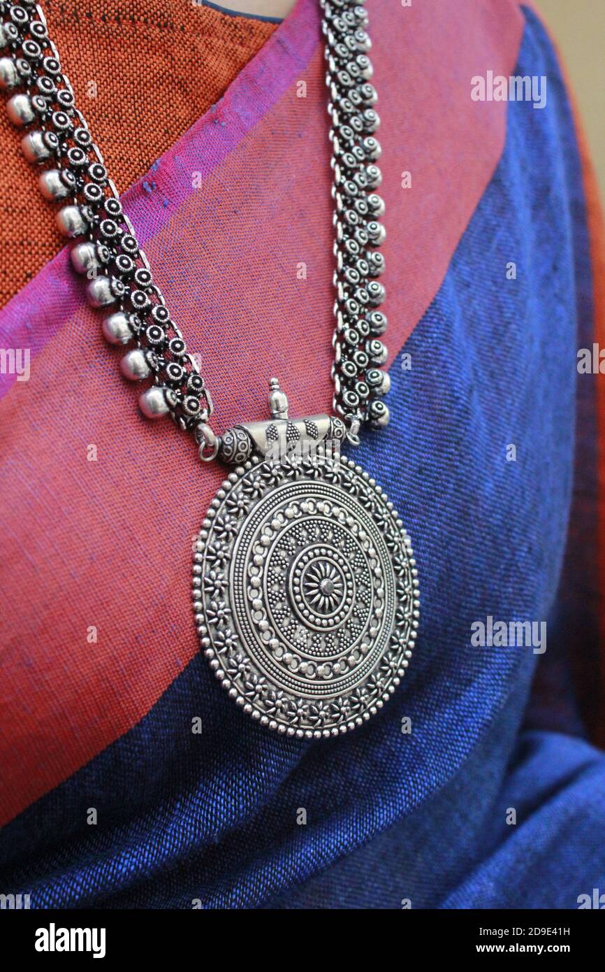 Indian woman wearing bohemian looking oxidised necklace Stock Photo