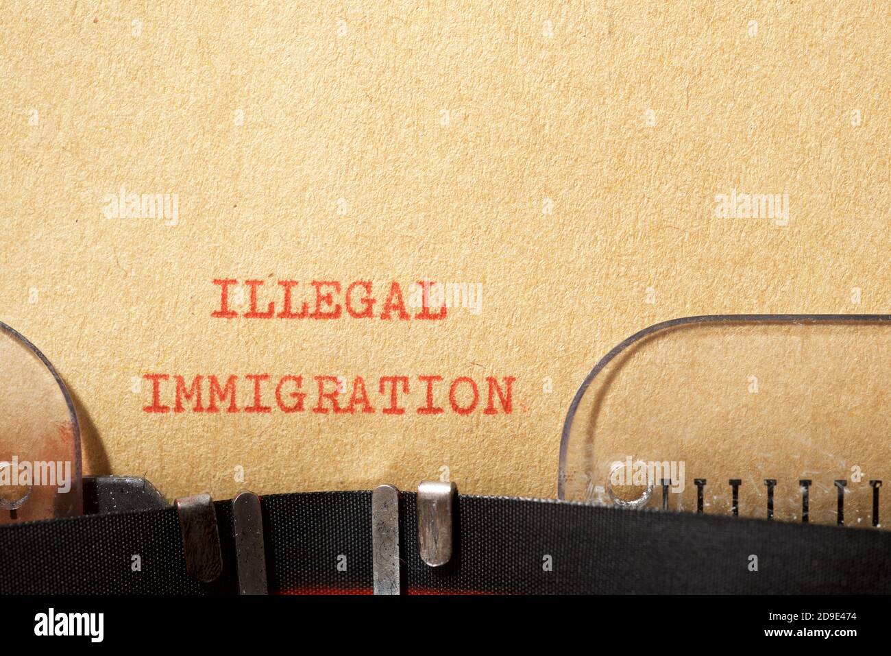 Illegal immigration phrase written with a typewriter Stock Photo - Alamy