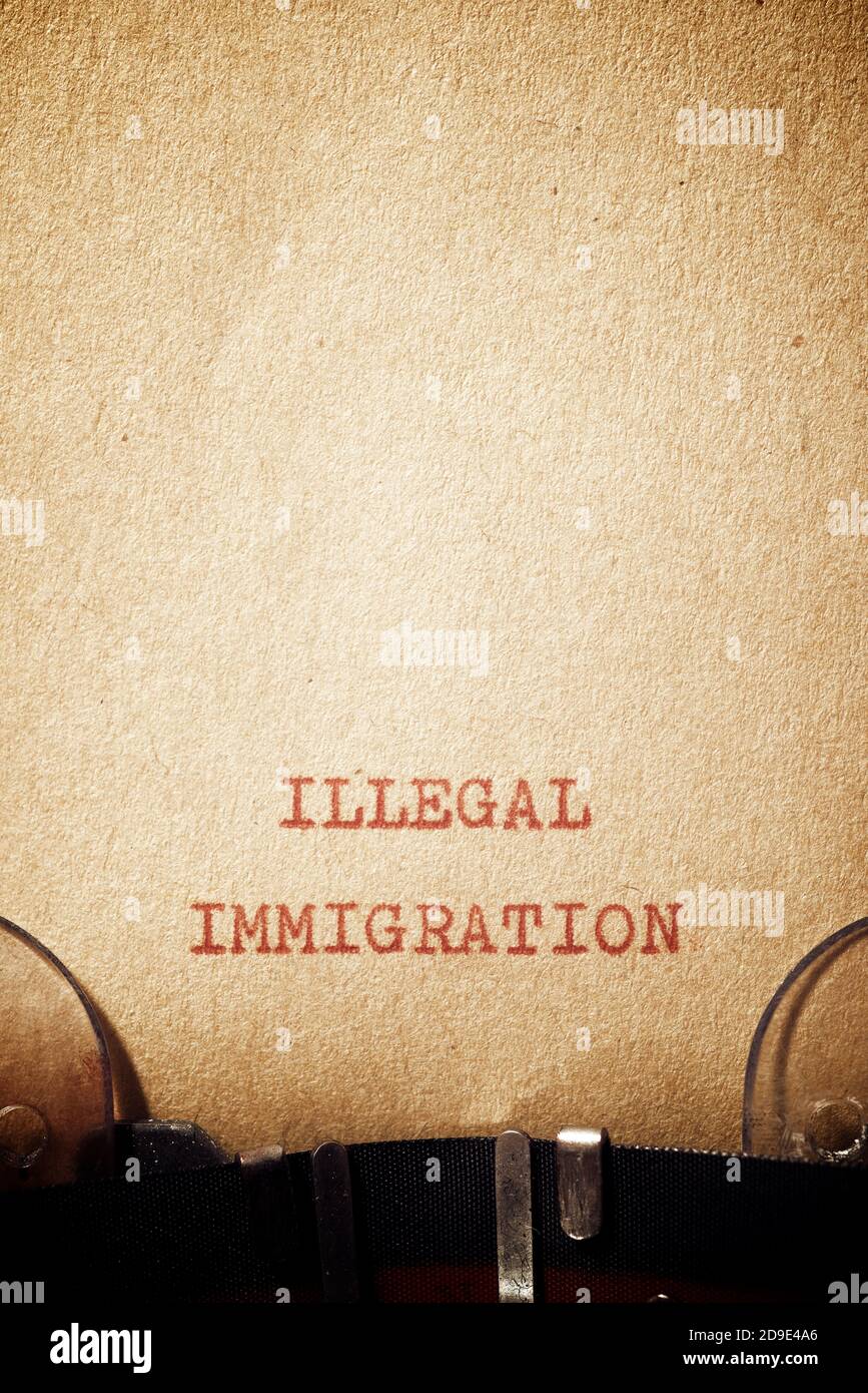 Illegal immigration phrase written with a typewriter Stock Photo - Alamy