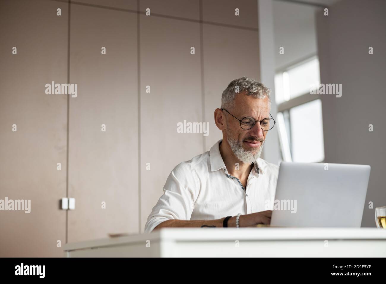 Determined specialist pressing the buttons on a keyboard Stock Photo