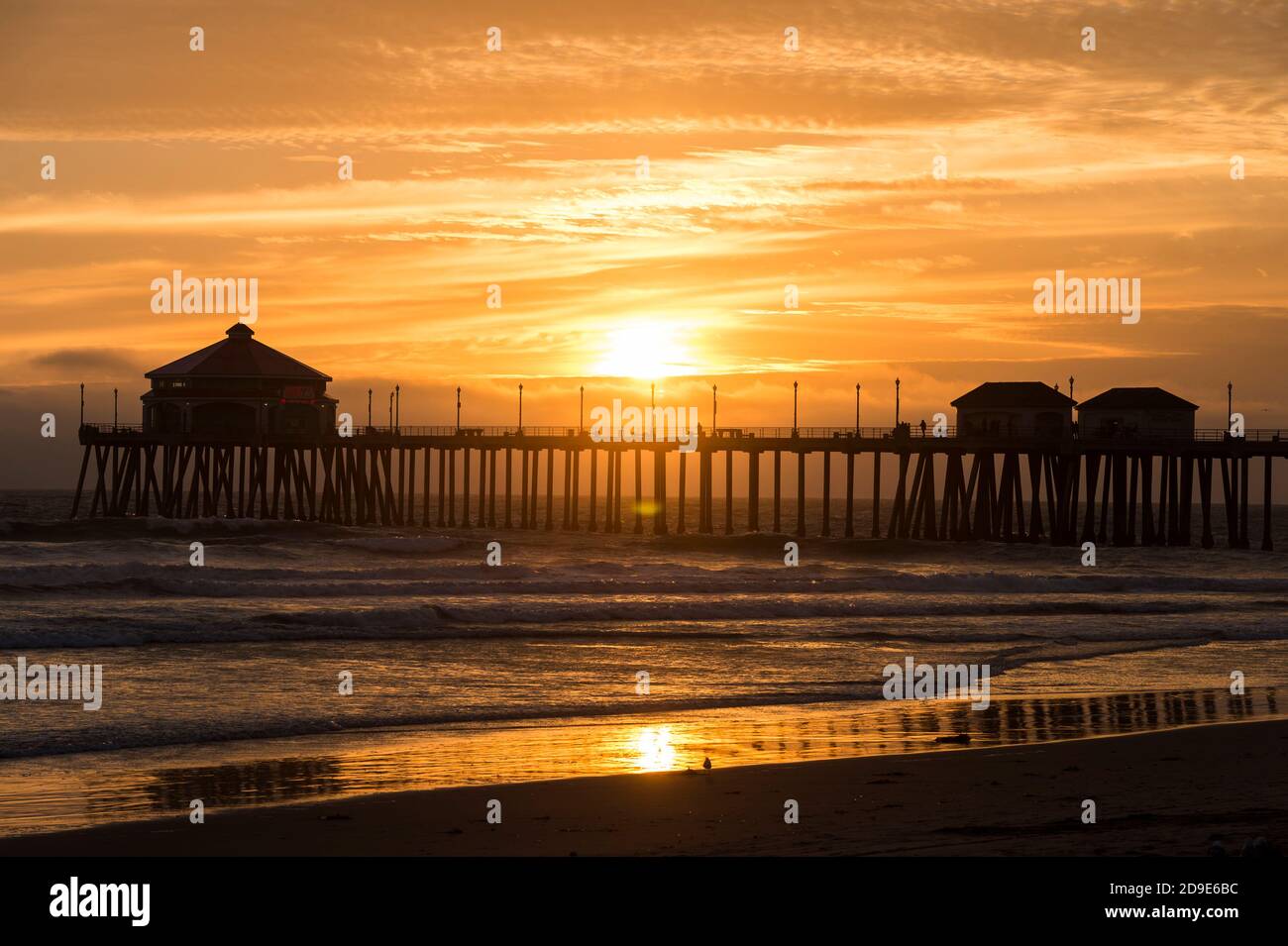 Sunset on Huntington Beach, south of Los Angeles, surfing and