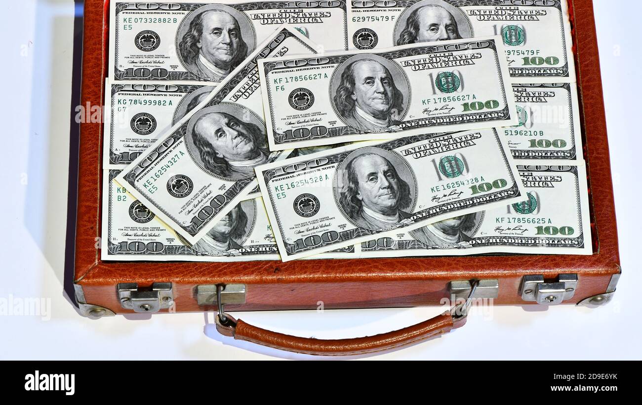 Image Of Big Bag Full Of American Dollars On The Floor Stock Photo