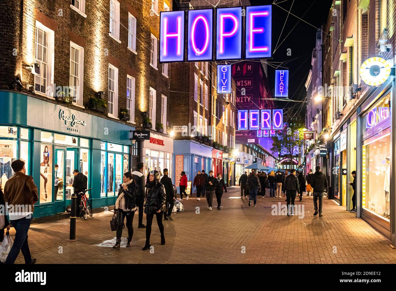 Carnaby street has its Christmas lights switched on, London. Stock Photo