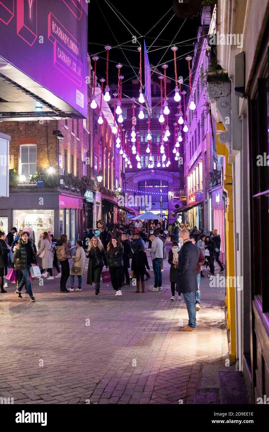 Carnaby street has its Christmas lights switched on, London Stock Photo