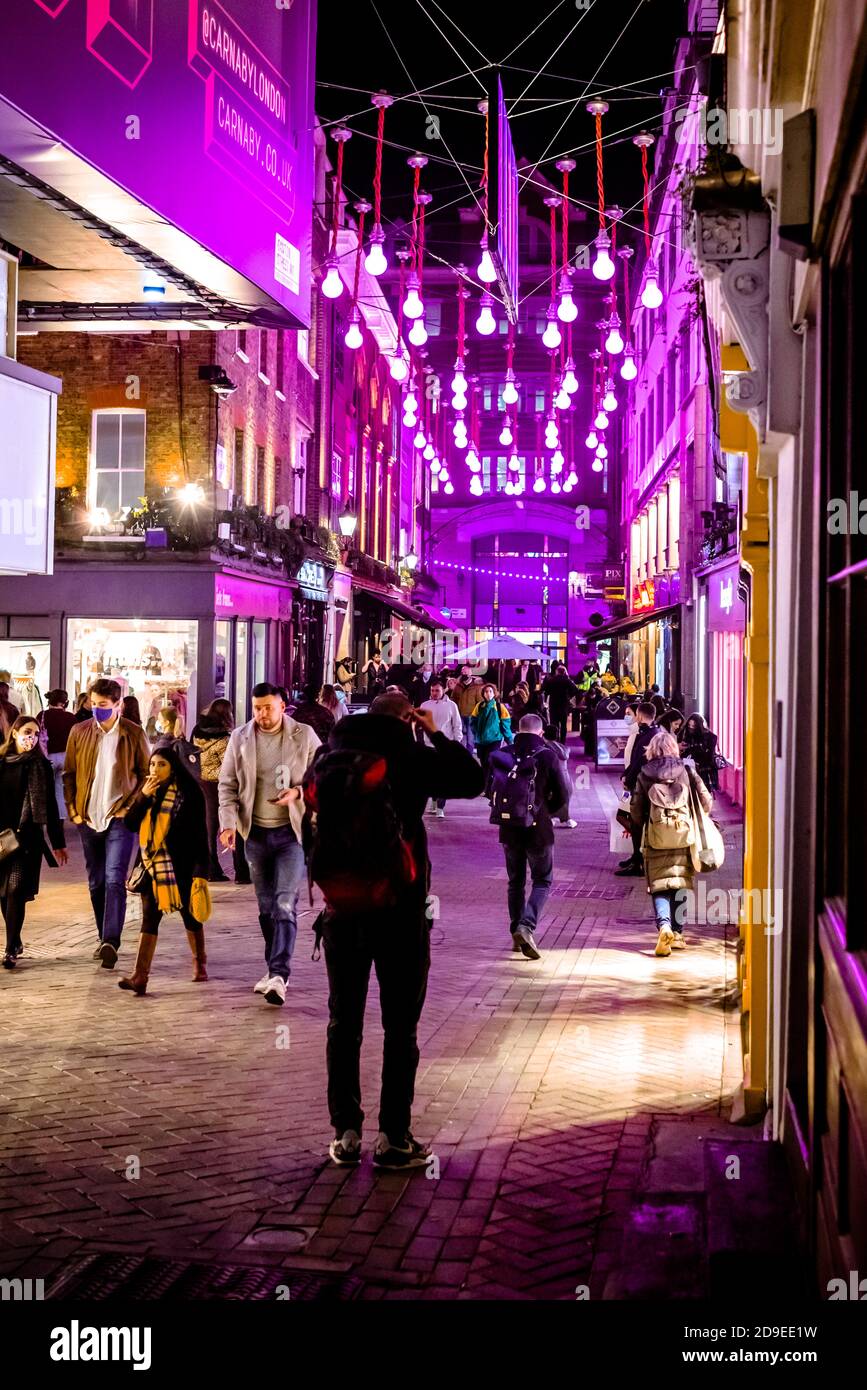 Carnaby street has its Christmas lights switched on, London Stock Photo