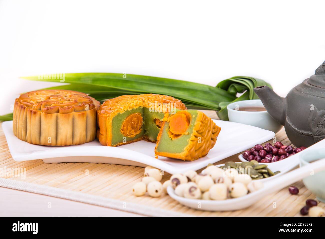 Mid-Autumn festival Chinese mooncake with ingredients and tea Stock Photo