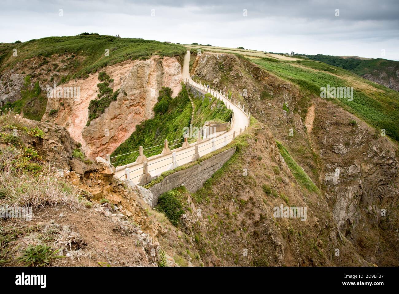 Joints the Sark and Small Sark - La Coupee is an Isthmus (narrow strip of land with sea either side) Stock Photo
