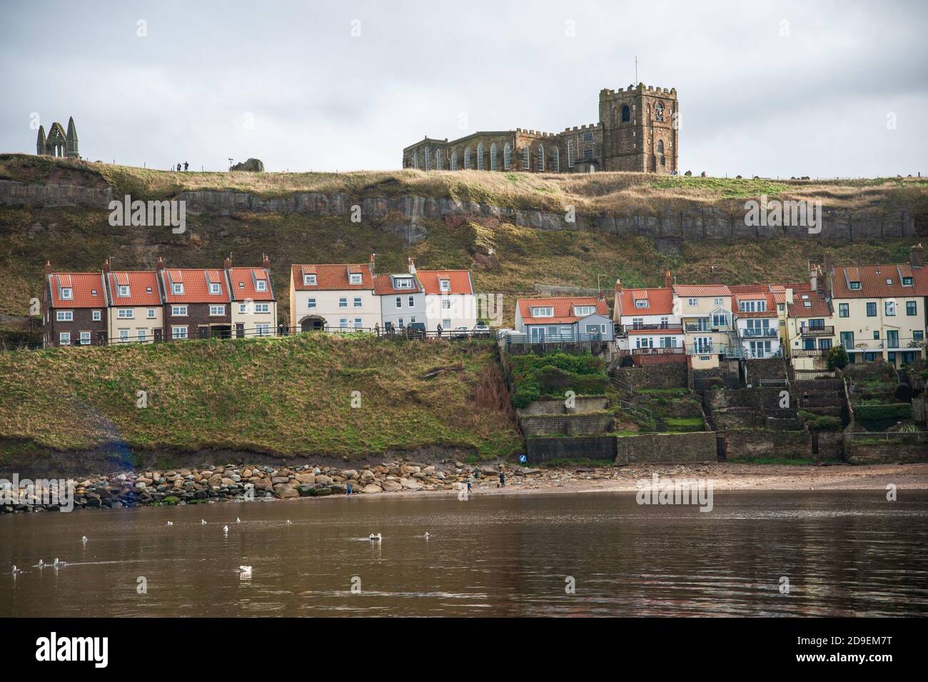a view of the beach and the abbey . Whitby Harbour, Whitby, Yorkshire, England. Stock Photo