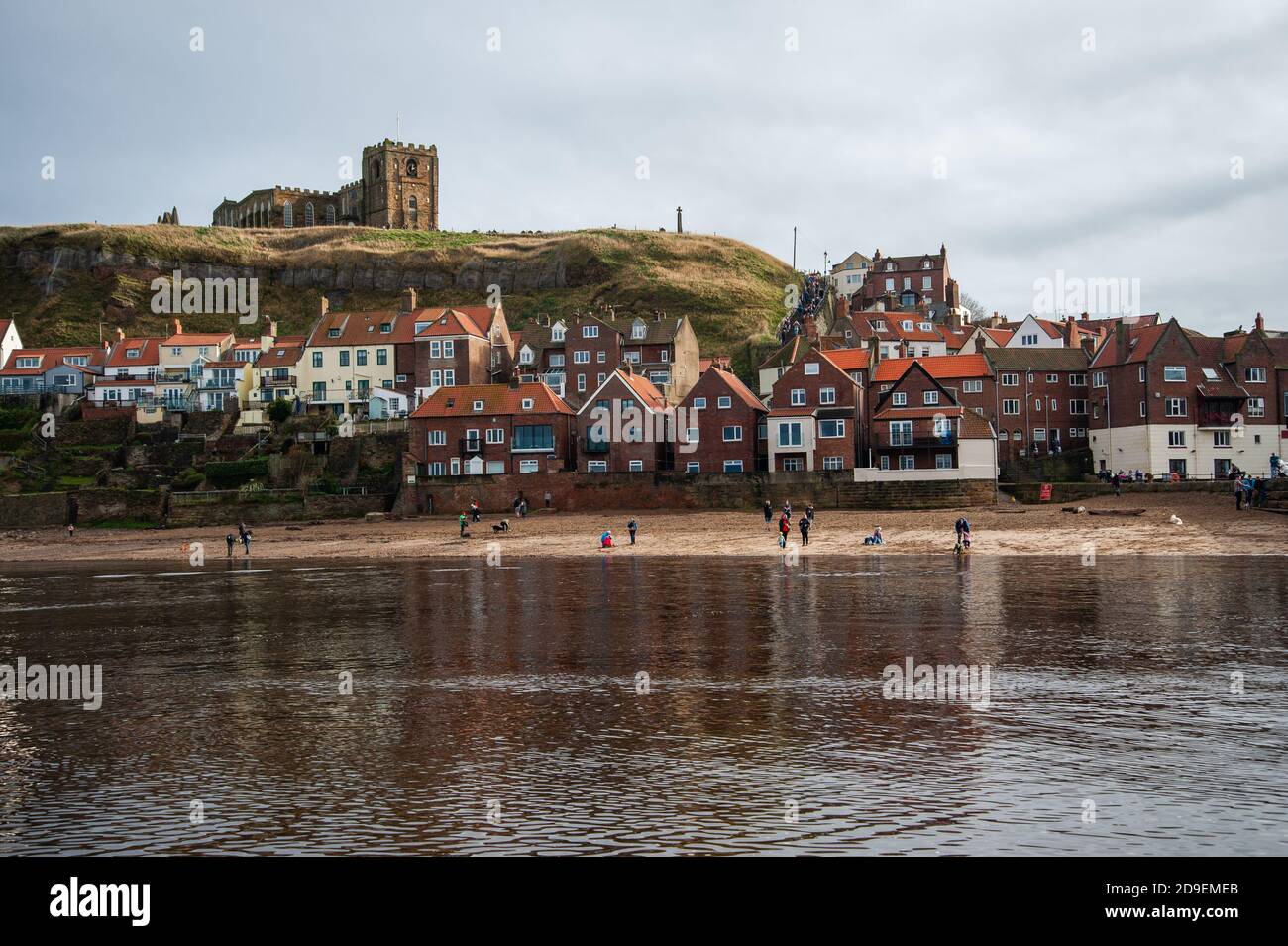 a view of the beach and the abbey . Whitby Harbour, Whitby, Yorkshire, England. Stock Photo