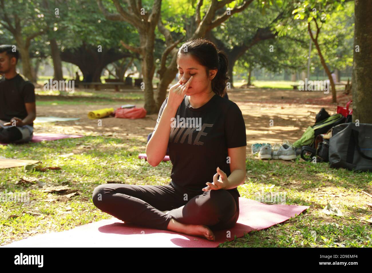 Pranayama (breathwork) at yoga in Cubbon Park, bangalore, India Stock Photo