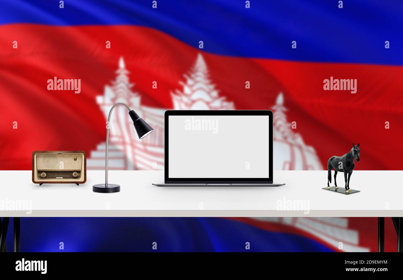Cambodia national flag background with workspace, desktop computer and