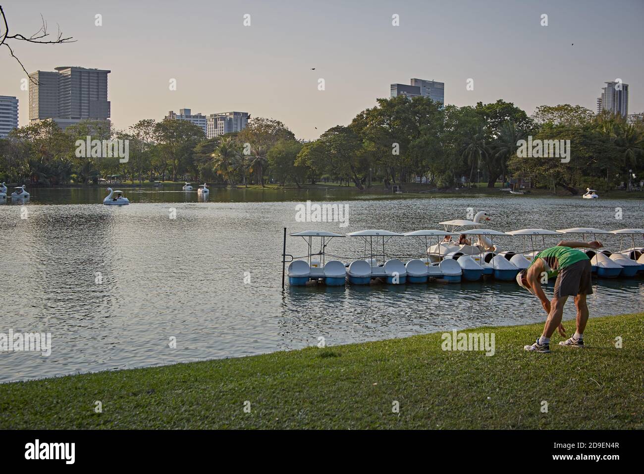 Bangkok, Thailand, March 2106. A man exercising by the lake in Lumpini Park. Stock Photo