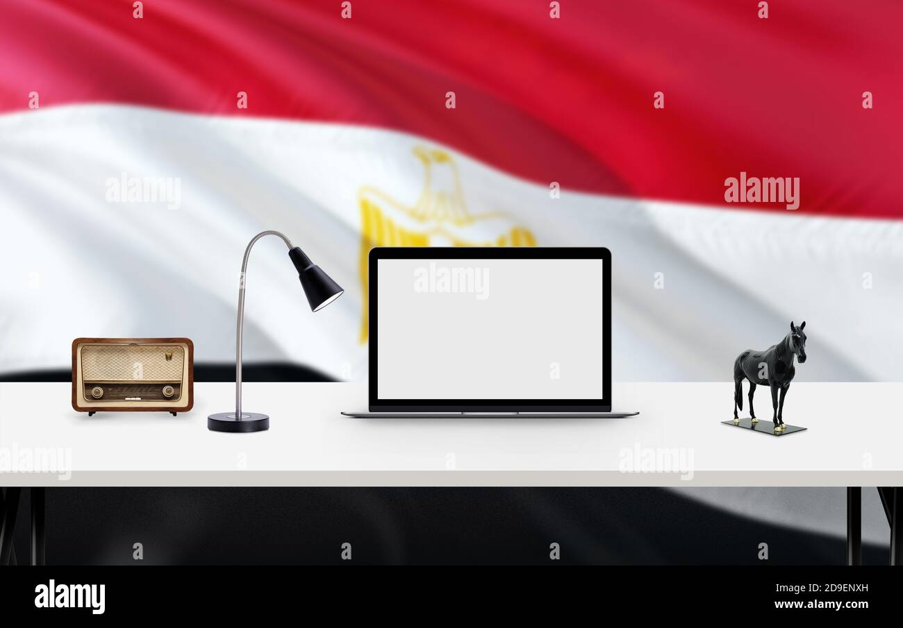 Egypt national flag background with workspace, desktop computer and