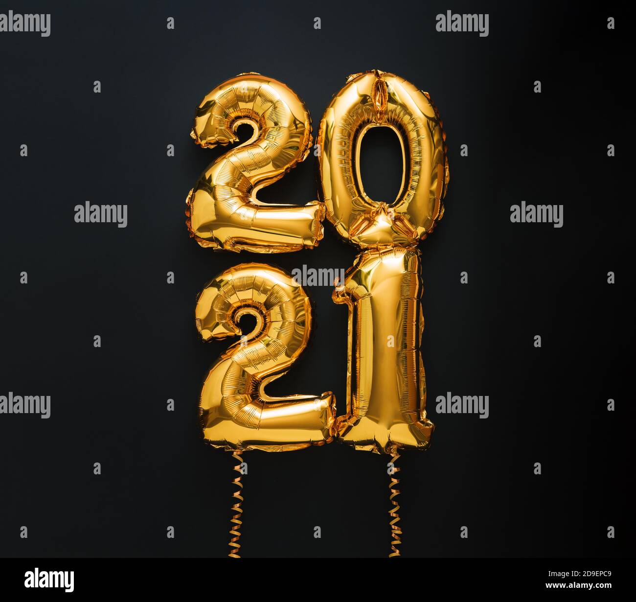 2021 air balloon gold text with ribbons on black background. Happy New year eve invitation with Christmas gold foil balloons 2021. vertical squere Stock Photo