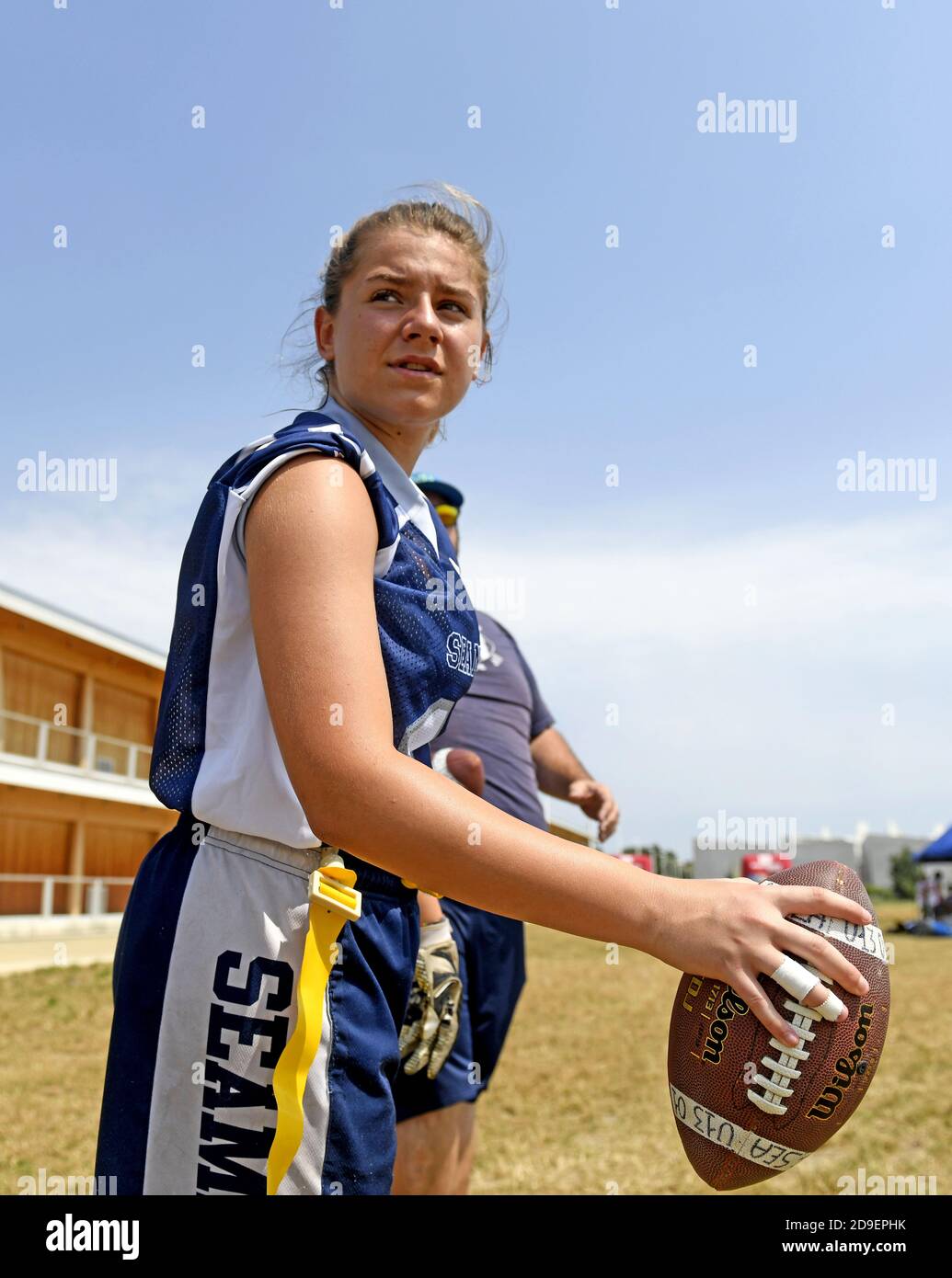 American football player and woman hires stock photography and images