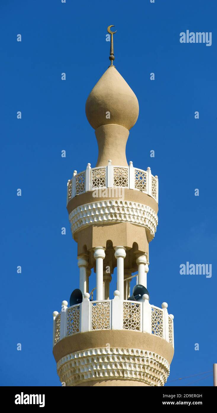 Mosque's minaret with blue sky. Stock Photo