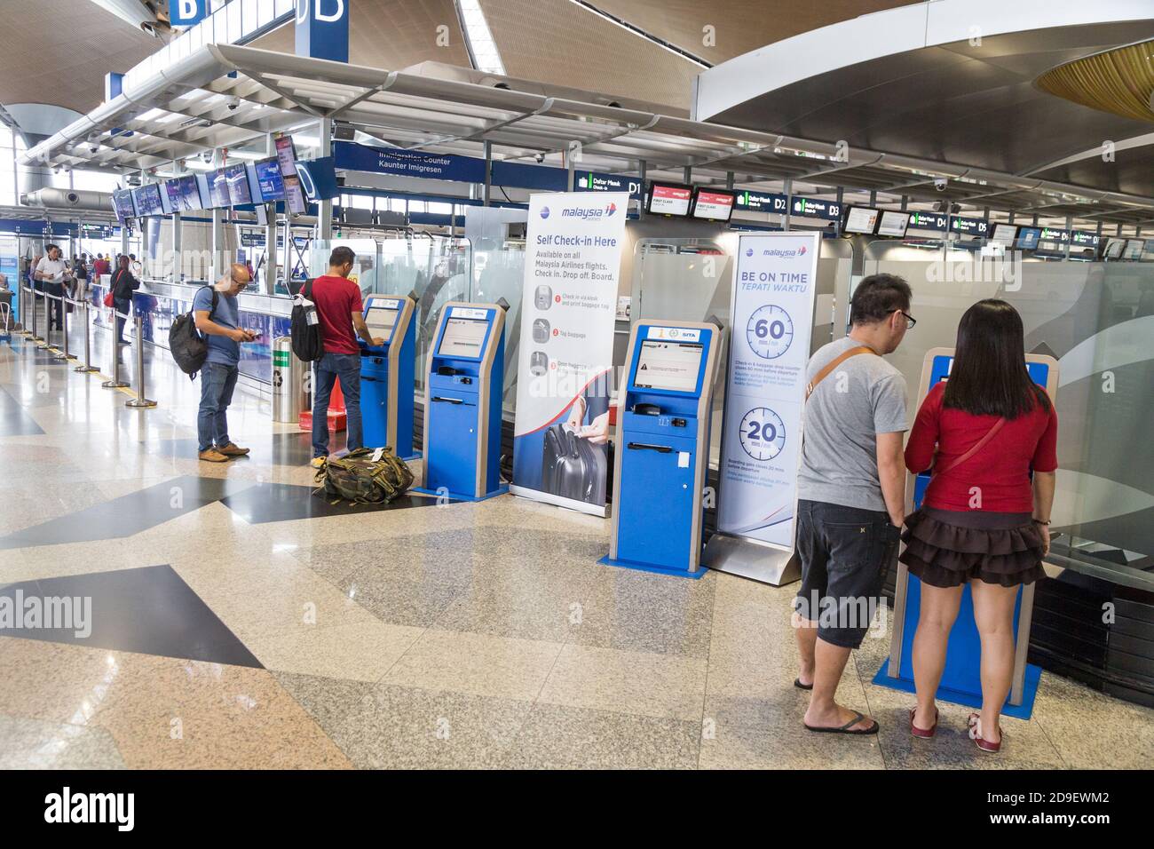 Flight self service checkin kiosk machine at KLIA Airport Stock Photo